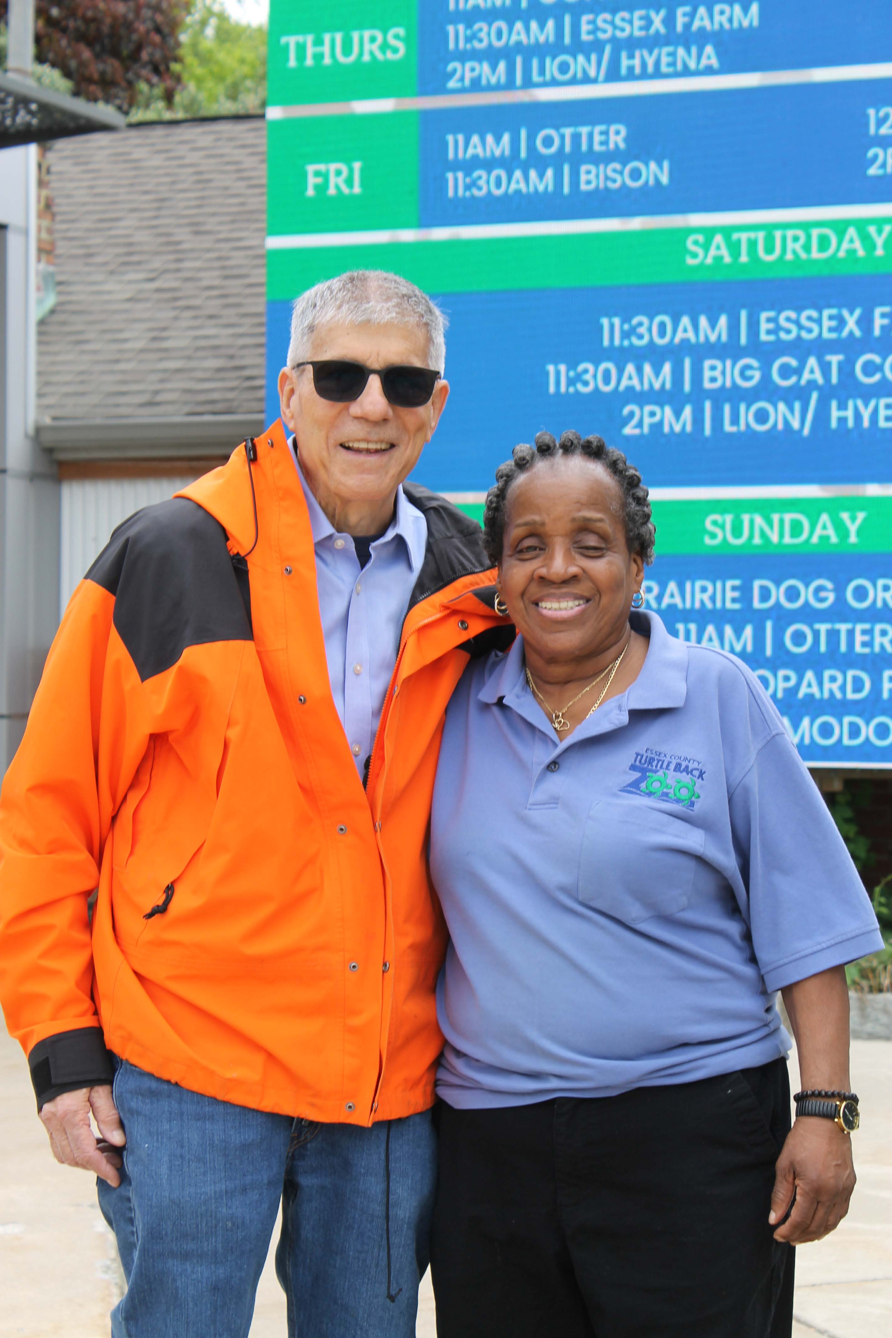 Larry Poster with a staff member at Essex County Turtle Back Zoo